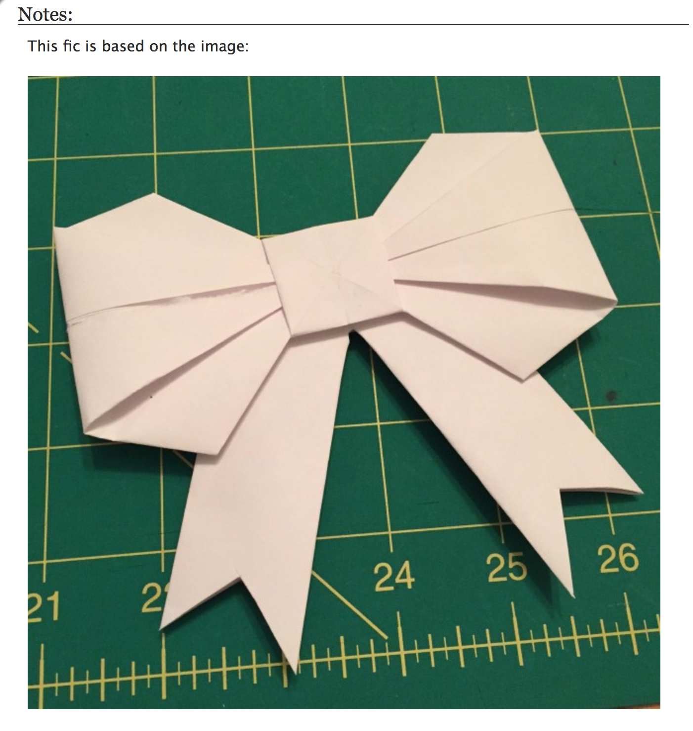Screenshot of the Notes on AO3 with an embedded photo of an origami bow.